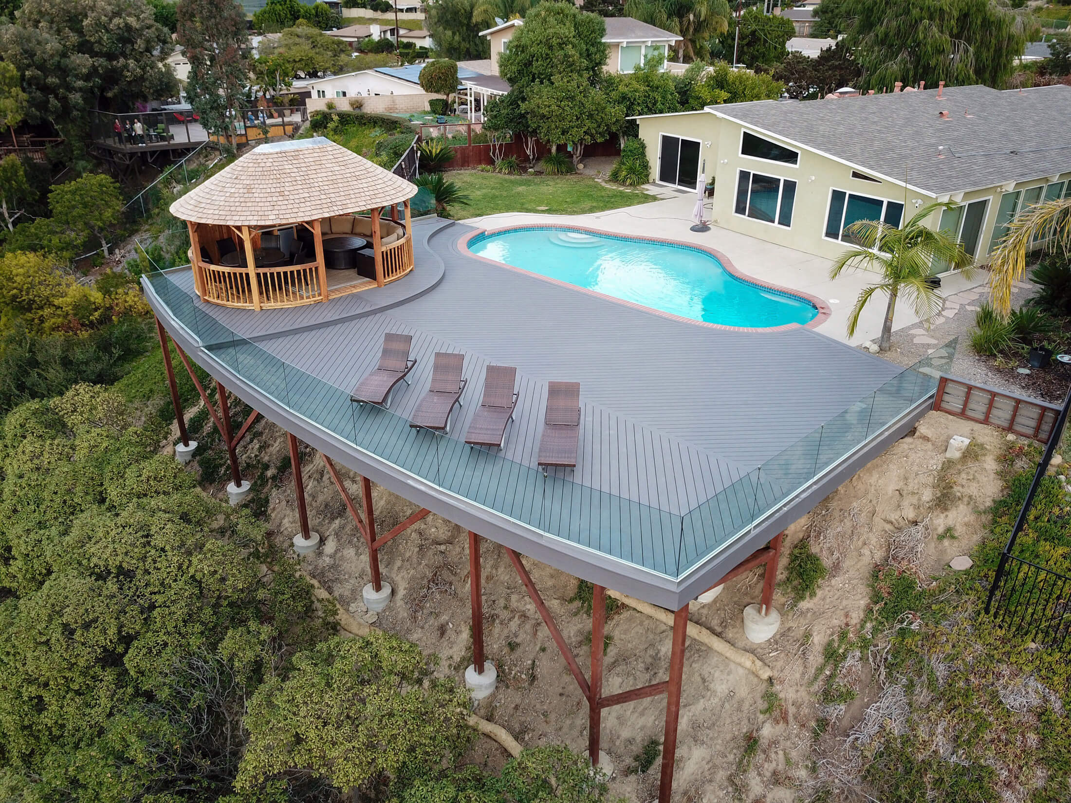 Aerial view of completed deck with Azek-Decking and pool in background